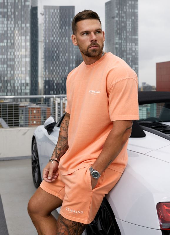 Gym King Est. Legacy Washed Tee Washed Coral Men Clothing J2PFB7 - Image 1